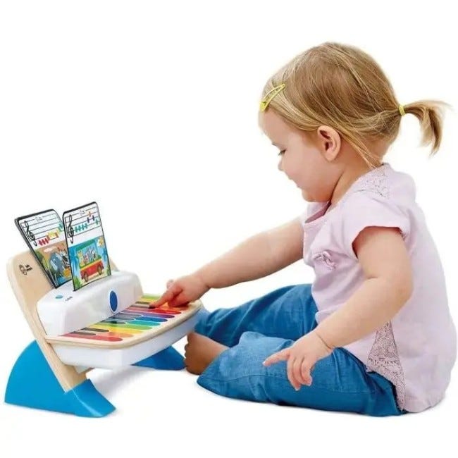 BABY EINSTEIN BY HAPE MAGIC TOUCH WOODEN MUSICAL PIANO