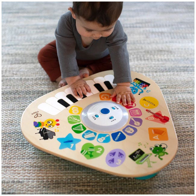 BABY EINSTEIN BY HAPE CLEVER COMPOSER WOODEN ACTIVITY TABLE