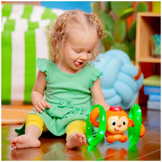 BRIGHT STARTS ROLL AND GLOW MONKEY TOY